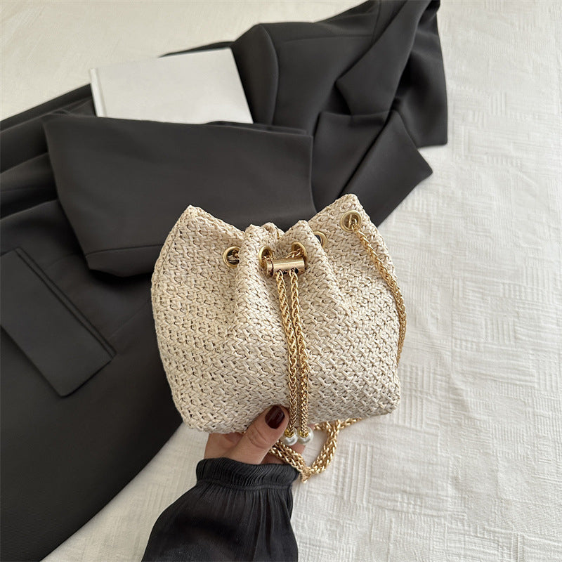 Sac seau en paille tressée avec chaîne à cordon pour femme  – Nouveau style d'été, navette, style coréen, sac à bandoulière uni simple