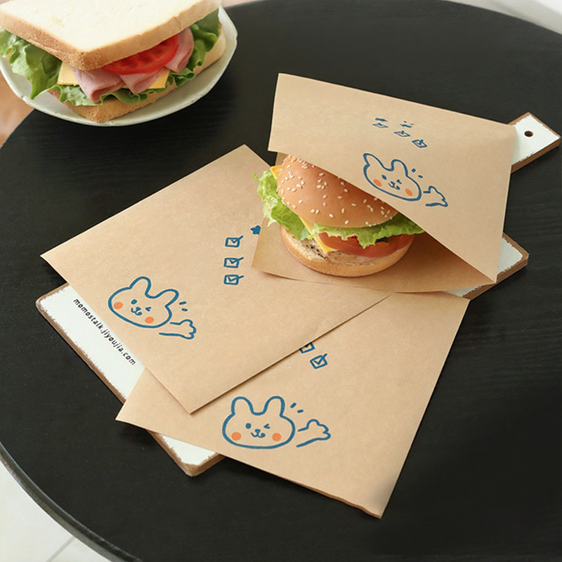 50 % de réduction pour une durée limitée ! Sacs en papier anti-graisse pour sandwichs : mignons, pratiques et conformes aux normes de sécurité alimentaire.