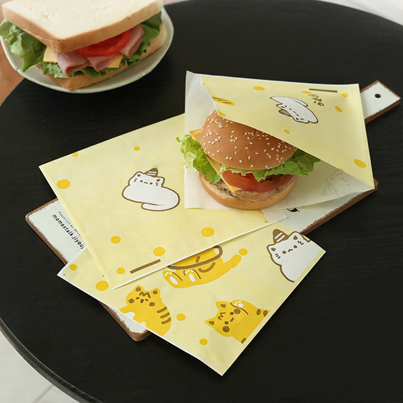 50 % de réduction pour une durée limitée ! Sacs en papier anti-graisse pour sandwichs : mignons, pratiques et conformes aux normes de sécurité alimentaire.